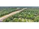 Aerial view of a residential area nestled beside a highway and lush greenery, offering both accessibility and tranquility at 2580 Star Ln, Decatur, GA 30034