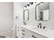 Beautifully renovated bathroom featuring dual sinks, modern fixtures, and stylish tile work at 2580 Star Ln, Decatur, GA 30034