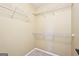 Walk-in closet with installed metal shelving, offering ample storage space for organizing clothes and accessories at 2580 Star Ln, Decatur, GA 30034