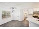 Dining area showcases a modern pendant light fixture and ample natural light flowing in at 2580 Star Ln, Decatur, GA 30034