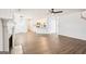 Living room displays open floor plan, fireplace with hearth and wood-look floors at 2580 Star Ln, Decatur, GA 30034