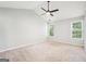 A simple and spacious main bedroom with neutral decor at 2580 Star Ln, Decatur, GA 30034