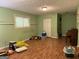 Basement with vinyl flooring, closet, window, and plenty of room for storage at 6875 Timberclair Ct, Lithonia, GA 30058