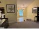 Bright living room adjacent to dining area perfect for entertaining guests at 6875 Timberclair Ct, Lithonia, GA 30058