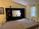 Cozy living room with built-in shelving, curtains, and natural light at 6875 Timberclair Ct, Lithonia, GA 30058