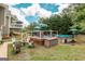 Spacious backyard featuring a deck, swimming pool, and seating area perfect for outdoor living at 53 Denny Ln, Dallas, GA 30157