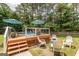 Inviting backyard with a pool, a patio, lounge chairs, and a seating area for entertaining at 53 Denny Ln, Dallas, GA 30157