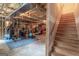 Unfinished basement featuring exposed ductwork, framing, and gym equipment at 53 Denny Ln, Dallas, GA 30157