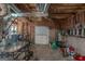 Unfinished basement with open ceiling, exposed duct work and utilities, and double door exit to the rear at 53 Denny Ln, Dallas, GA 30157