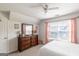 Bright bedroom with large window, dresser, and neutral tones at 53 Denny Ln, Dallas, GA 30157