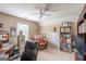 Office space with a bookshelf and comfortable chair with an office desk and chair at 53 Denny Ln, Dallas, GA 30157