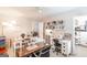 Spacious craft room with multiple tables and storage, ideal for creative projects at 53 Denny Ln, Dallas, GA 30157