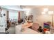 Bright and airy craft room with multiple workspaces, natural light, and ample storage at 53 Denny Ln, Dallas, GA 30157