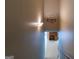 Hallway with stairway leading to an upper floor with a decorative 'Gathering' sign at 53 Denny Ln, Dallas, GA 30157