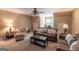 Cozy living room with seating, carpeted floors, decorative lamps, and a window to the outside at 53 Denny Ln, Dallas, GA 30157