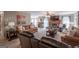Spacious living room with cozy seating, a fireplace, and a ceiling fan, creating a comfortable atmosphere at 53 Denny Ln, Dallas, GA 30157