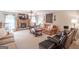 Relaxing living room featuring a stone fireplace, a ceiling fan, and plush seating, perfect for entertaining at 53 Denny Ln, Dallas, GA 30157
