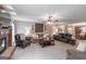 Inviting living room features a cozy fireplace, comfortable seating, and an open layout for seamless entertaining at 53 Denny Ln, Dallas, GA 30157