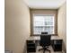 Dedicated office space with built-in desk area and natural light from the window at 53 Denny Ln, Dallas, GA 30157