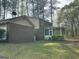 A large brick home with a screened-in porch and plenty of outdoor space at 110 Riley Ave, Fayetteville, GA 30214