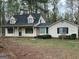Inviting single-Gathering home with a covered front porch and well-maintained lawn at 110 Riley Ave, Fayetteville, GA 30214