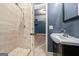 Bathroom with glass shower and modern basin sink at 3865 Rifflepool Ct, Douglasville, GA 30135