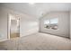 Bedroom with carpet and doorway leading to bathroom at 3865 Rifflepool Ct, Douglasville, GA 30135