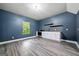 Bright kitchenette space with white cabinets, butcher block counters and stainless appliances at 3865 Rifflepool Ct, Douglasville, GA 30135