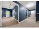 Spacious carpeted living room with white trim and doors at 3865 Rifflepool Ct, Douglasville, GA 30135