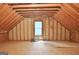 Spacious attic with window, perfect for storage or future expansion at 1709 Reese Rd, Sharpsburg, GA 30277