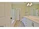 Bathroom featuring double vanity, glass shower, and tile floors at 1709 Reese Rd, Sharpsburg, GA 30277