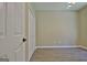 Bedroom with neutral walls, hardwood floors, a ceiling fan, and bi-fold closet doors at 1709 Reese Rd, Sharpsburg, GA 30277