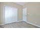 Bedroom with hardwood floors, a ceiling fan, closet and neutral walls at 1709 Reese Rd, Sharpsburg, GA 30277