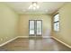 Bright bedroom with large sliding doors and multiple windows, offering ample natural light at 1709 Reese Rd, Sharpsburg, GA 30277