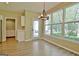 Breakfast nook is full of light and features hardwood floors and views of the backyard at 1709 Reese Rd, Sharpsburg, GA 30277