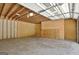 Large garage with open ceiling, perfect for storing vehicles and equipment at 1709 Reese Rd, Sharpsburg, GA 30277