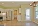 Kitchen features stainless steel appliances, hardwood floors, and ample storage space at 1709 Reese Rd, Sharpsburg, GA 30277