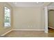 Bright and spacious living room boasts modern floors and ample natural light at 1709 Reese Rd, Sharpsburg, GA 30277