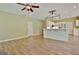 Open living area with a bar overlooking the kitchen, creating a seamless flow at 1709 Reese Rd, Sharpsburg, GA 30277