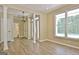Spacious living room boasts wood-look floors, neutral walls, and an open layout at 1709 Reese Rd, Sharpsburg, GA 30277