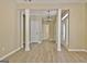 Bright living room features hardwood floors, white columns, and neutral walls at 1709 Reese Rd, Sharpsburg, GA 30277