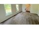 Spacious living room filled with natural light and plush carpet flooring throughout at 1875 Tree Brooke Ln, Snellville, GA 30078