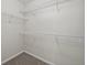 Spacious walk-in closet with multiple wire shelving units at 65 Pecan Ln, Oxford, GA 30054