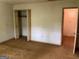 Bedroom featuring closet and doorway at 807 Oak Bridge Ln, Fayetteville, GA 30214
