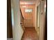 Inviting foyer featuring hardwood floors, staircase, and a charming chandelier at 807 Oak Bridge Ln, Fayetteville, GA 30214