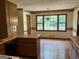Eat-in kitchen area with lots of natural light and wood trim at 807 Oak Bridge Ln, Fayetteville, GA 30214