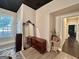 Hallway featuring stylish decor, hardwood floors, and contemporary color scheme at 6192 Collins Ne St, Covington, GA 30014