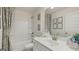 Bright bathroom with tub and shower combo, stylish decor, and modern vanity area at 687 Edgar St # 83, Hampton, GA 30228