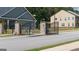 View of gated entrance to neighborhood homes at 687 Edgar St # 83, Hampton, GA 30228