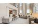 Bright living room features soaring ceilings, large windows, and neutral decor with views from second story loft at 687 Edgar St # 83, Hampton, GA 30228